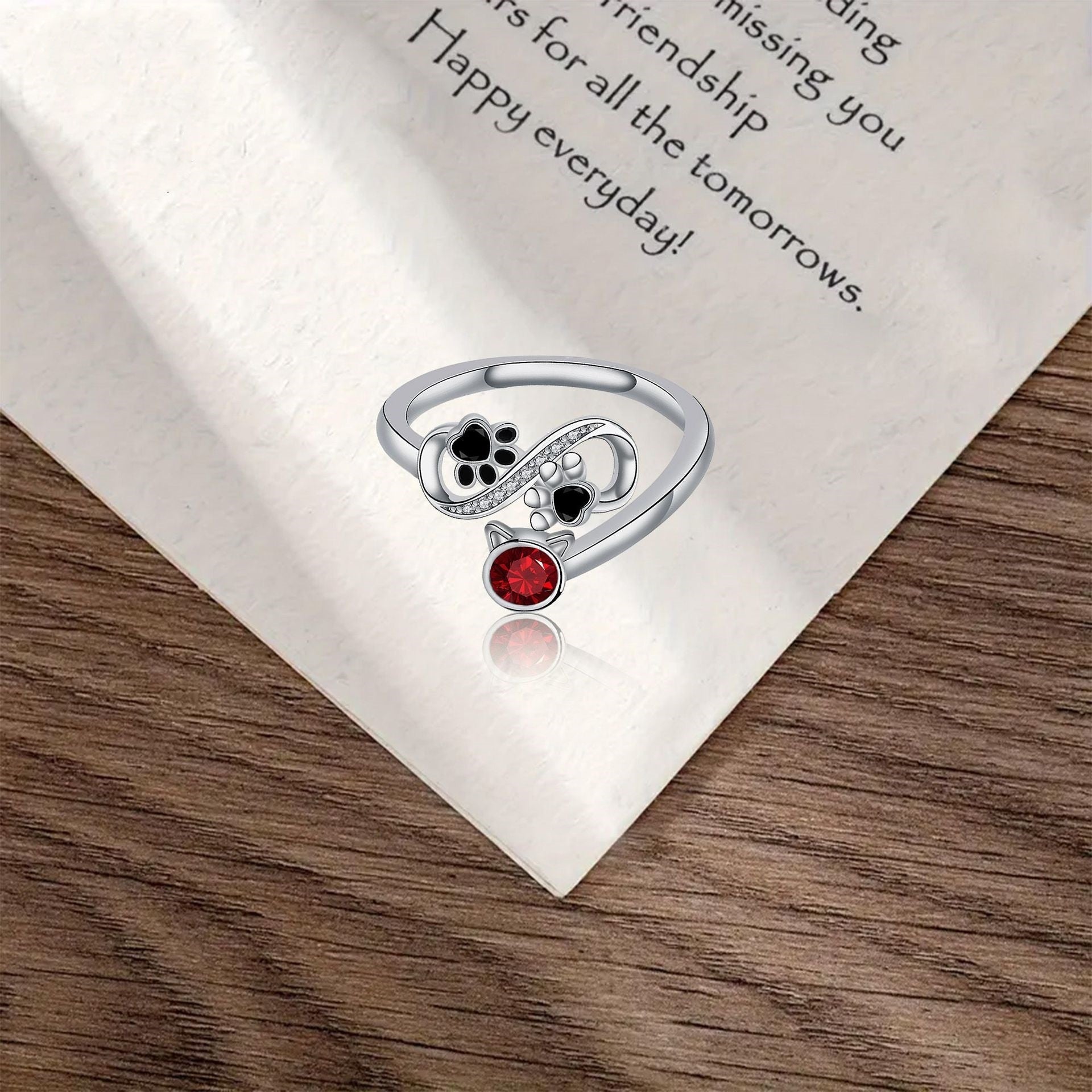 Black Paw Print Adjustable Ring With Red Gemstone